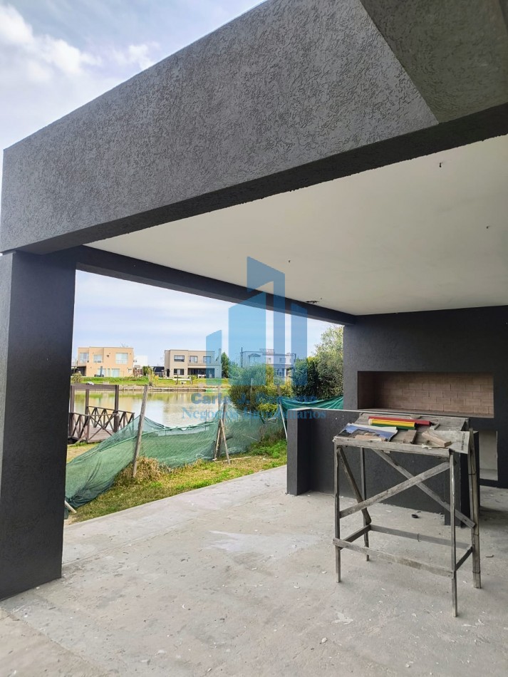 VENTA CASA 6 AMBIENTES EN BARRIO EL CANTON CON VISTA A LAGUNA , ESCOBAR 