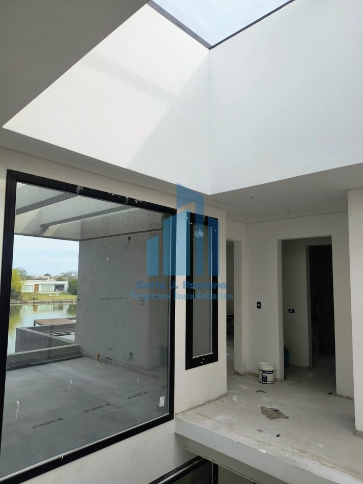 VENTA CASA 6 AMBIENTES EN BARRIO EL CANTON CON VISTA A LAGUNA , ESCOBAR 